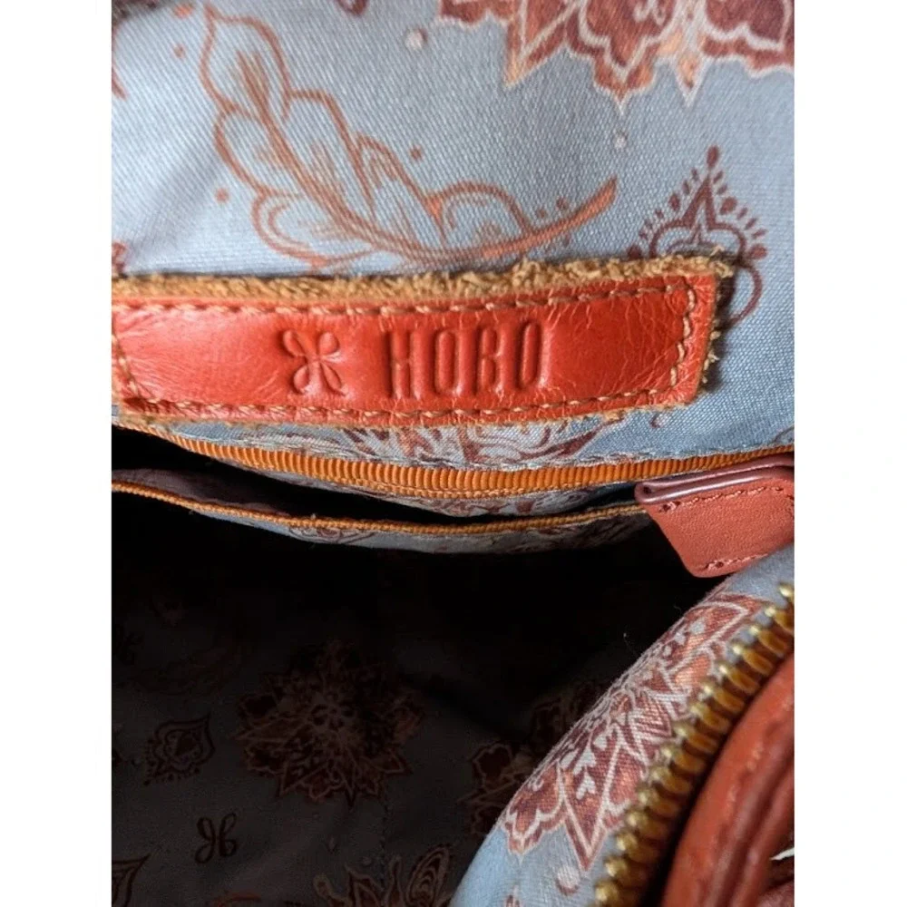 HOBO Merrin Convertible Backpack Shoulder Bag‎ Cinnamon Pebbled Leather Tassel